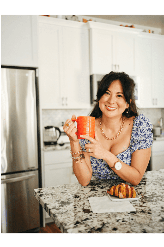 A happy Palm Bay, FL woman in a pest free kitchen